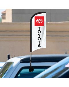 Custom Car Window Feather Flags on vehicle at auto dealership