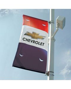 Single-Sided Horizontal Drape Flags with Sleeves on a pole over an auto dealership