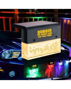 Color Changing Fence Post Lights at night on car dealership fence