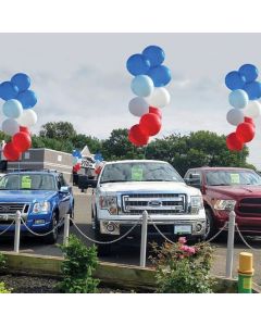 17" Jumbo Balloons Red White Blue at auto dealership