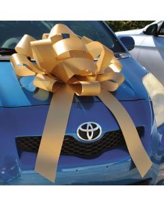 30" Giant Showroom Bows - Gold on vehicle hood at an auto dealership