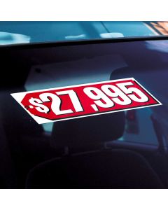 Red Tag Pricer Signs on vehicle windshield in auto dealership lot